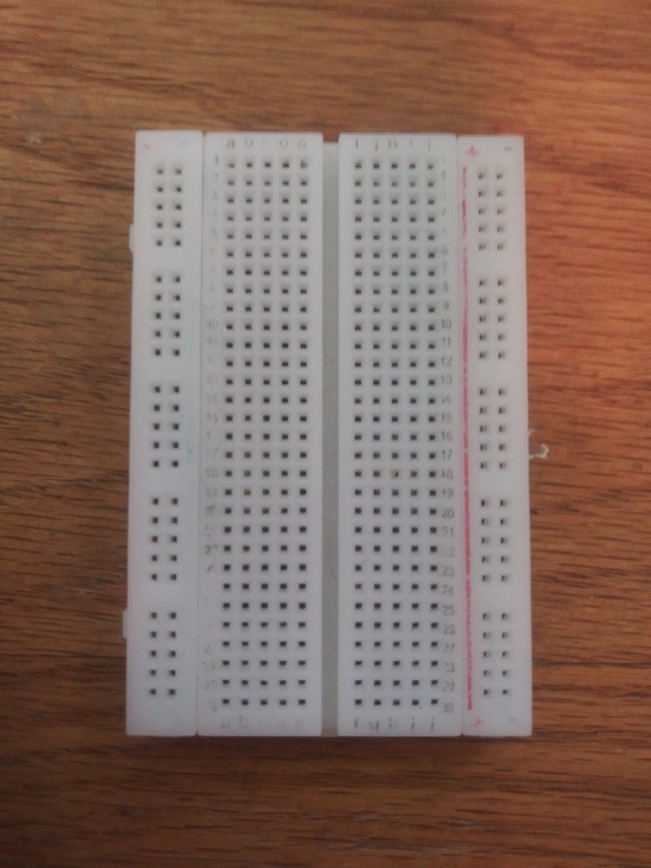 Alt Text: Picture of a breadboard without lines